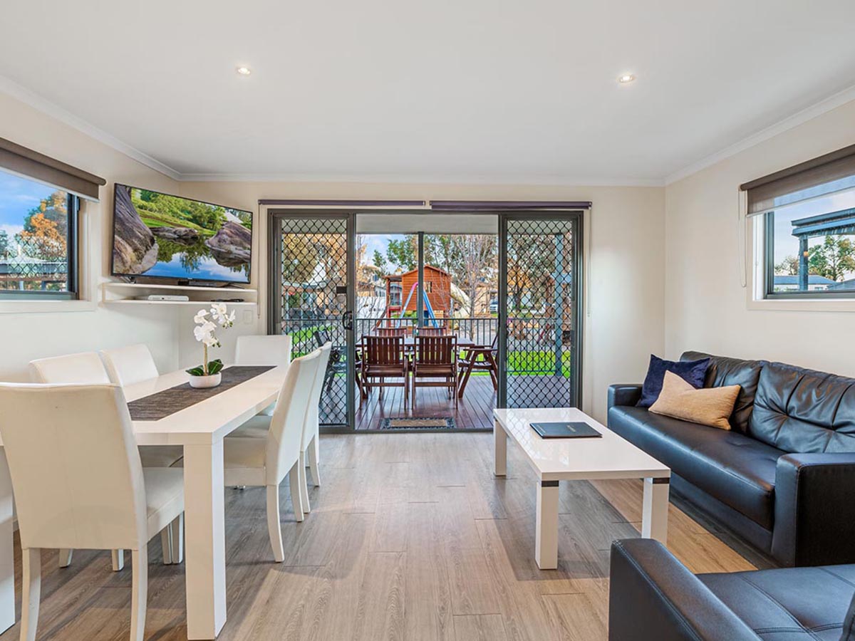 Lounge and Dining with View to Private Deck,